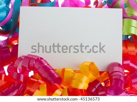 Empty card on curly ribbons