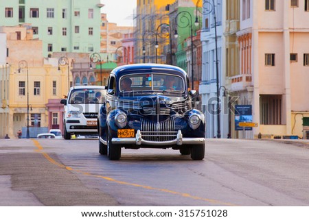 HAVANA, CUBA - FEBRUARY 15, 2013: Old retro car Chrysler on the road