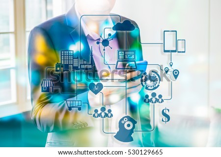 Marketing Data management platform concept image. Data collection icons with Big data analytic message on Double exposure of business man using smart phone, bokeh light.