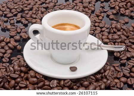 express coffee with grains of coffee