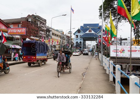 CHIANGRAI, THAILAND - OCT 11 : people and vehicle waiting to pass at Thailand - Myanmar border trade customs at Measai Chiangrai Thailand on October 11, 2015
