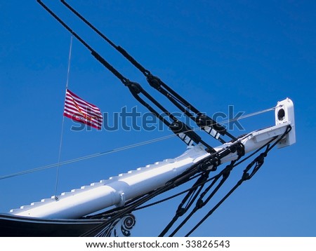 The bow of the U.S.S. Constitution with the flag of the American Revolution at Boston Harbor, Massachusetts