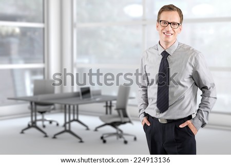 Portrait of a young businessman in the office