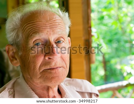 face portrait of a serious senior man