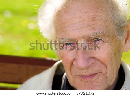 closeup portrait of an old smiling person