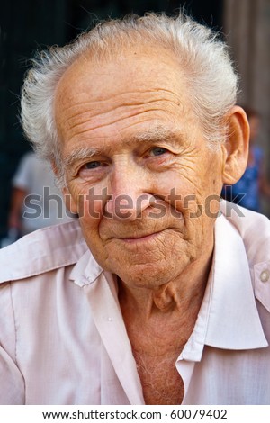 face portrait of a smiling senior man