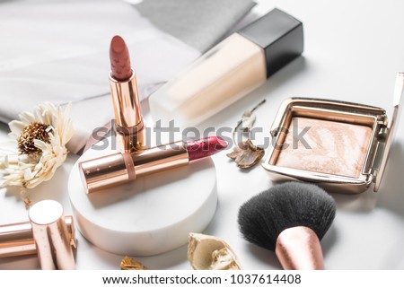 luxury beautiful light  design cosmetic makeup brand brand gold nude orange pink lipstick foundation blusher bronzer brush flower accessories white background