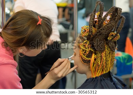 ODESSA, UKRAINE - MAY 15: Making a hairstyle at hairdressers contest\