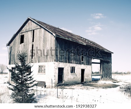 Winter scene of old barn