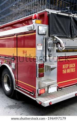 An up close view of the back of a fire truck.