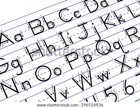Capital letters beside small letters are written on a paper.