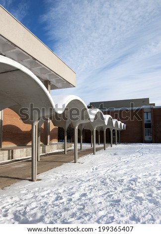 Covered walkway along school buildings
