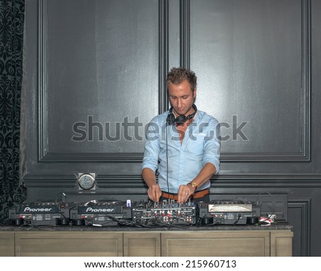 Toronto - September 8, 2014: DJ David-Alexandre Fain at the America Restaurant afterparty for the film 99 Homes.