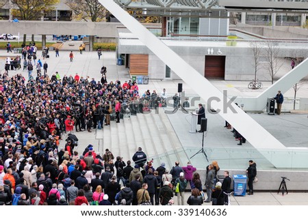 Toronto November 14, 2015
Crowds gather at Toronto's Nathan Phillips Square for a silent vigil this afternoon to honour those lost and injured in the terror attacks on Paris.