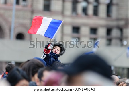 Toronto November 14, 2015\
Crowds gather at Toronto\'s Nathan Phillips Square for a silent vigil this afternoon to honour those lost and injured in the terror attacks on Paris.
