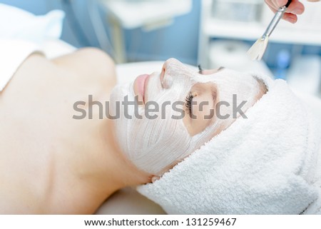 Woman having facial mask at beauty salon Woman having facial mask at beauty salon