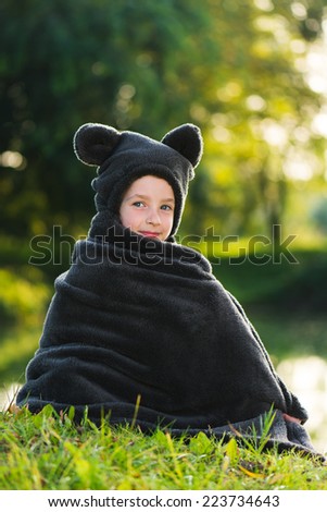 Cute girl posing in bear costume
