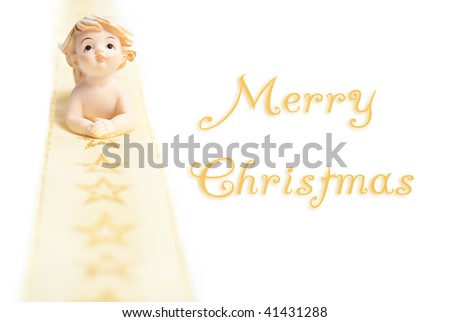 angel christmas ornament. little ceramic angel on christmas background