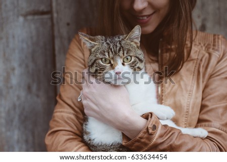 Cute cat portrait with cat owner