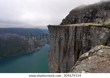 Preikestolen 3\
Preikestolen or Prekestolen, also known by the English translations of Preacher\'s Pulpit or Pulpit Rock, is a famous tourist attraction in Forsand, Ryfylke, Norway.