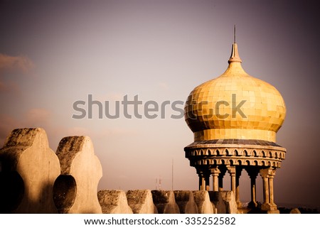 Detailed Wall Leads to Beautiful Yellow Castle Sultan Dome Peak