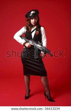 A young and sexy officer with an assault rifle.