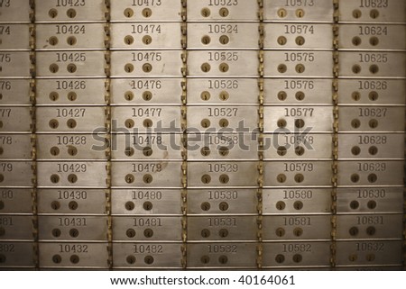 stock-photo-safety-deposit-boxes-in-a-bank-vault-40164061.jpg