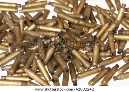 stock-photo-pile-of-spent-bullet-casings-42002242.jpg