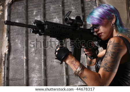 Punk rock girl with an assault rifle.