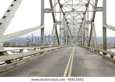 Traveling across a bridge.