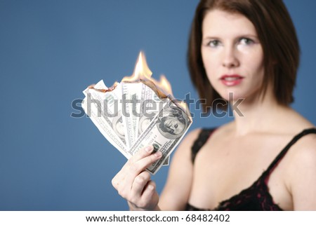 Sexy young woman with money to burn.