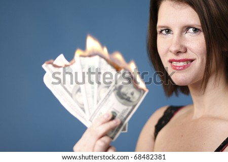 Sexy young woman with money to burn.
