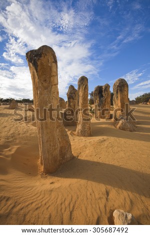 Pinnacle Desert is a true desert landscape in Nambung National Park, where the weathered rock spires of the Pinnacles rise out of yellow sand dunes