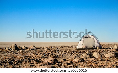 A tent pitched overlooking the makgadikgadi pans in Botswana