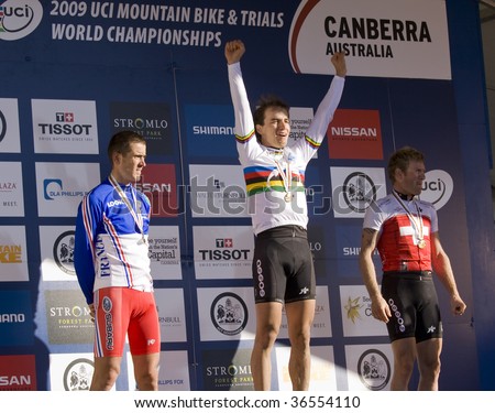 CANBERRA, ACT - Sep 5: Podium of the 2009 UCI Mountain Bike Championships, elite men cross country. Florian VOGEL, Switzerland 3rd, Julien Absalon from France 2nd,  Nino Schurter from Switzerland 1st. Sept 5, 2009 in Canberra Australia.