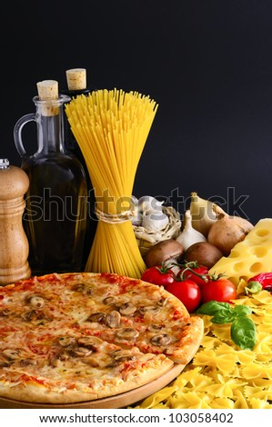 traditional italian food with pizza, pasta and ingredients