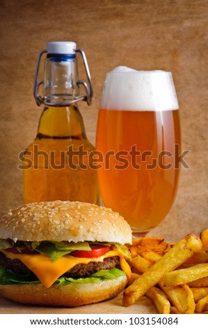 Fast food hamburger menu with french fries and beer