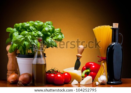 still life with traditional food ingredients for italian cuisine