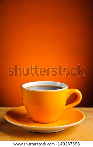 Still Life With Orange Espresso Coffee Cup