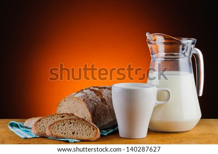 still life with organic milk and fresh baked bread