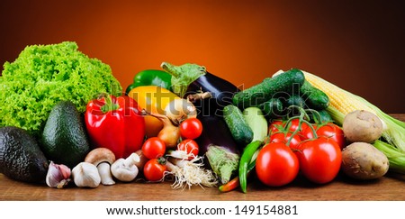 still life with pile of fresh organic vegetables
