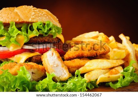 Fast food menu with chicken nuggets, hamburger and french fries