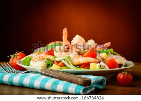 still life with healthy fresh seafood salad with prawns