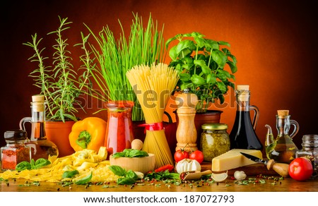 still life with traditional italian pasta ingredients, herbs and spices