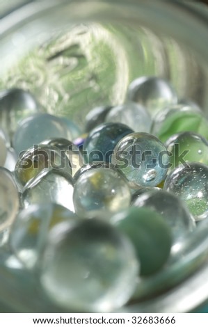 Marbles In Jar. stock photo : Marbles spill