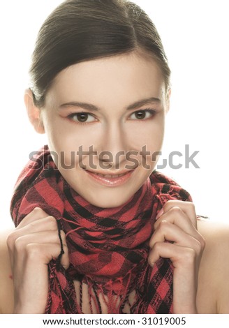 Portrait of  pretty young woman in pink and black scarf