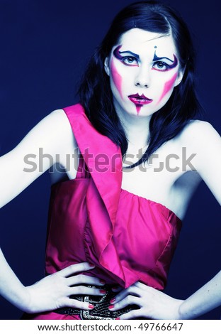Portrait of young lady with creative make-up in cold tones