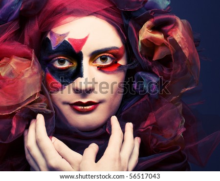 how to do exotic makeup. stock photo : Young woman with creative make-up and in exotic hat