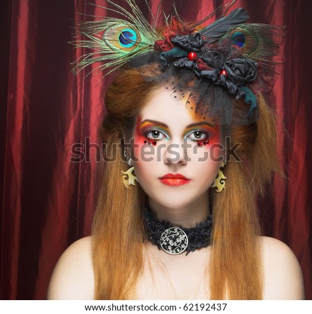 Diva. Portrait of young woman in exotic creative image.