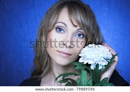 Young woman with creative visage and  with lollipop